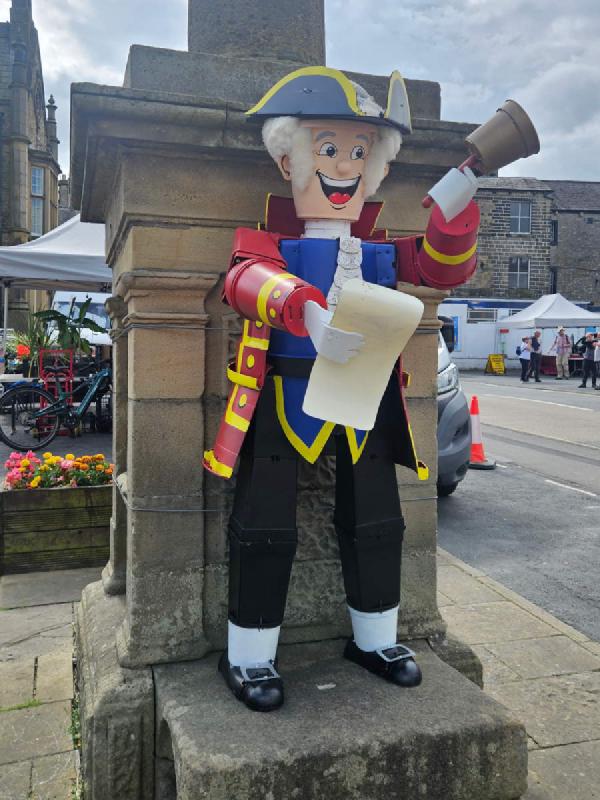 Town crier - Literate, a loud voice, and an air of authority.